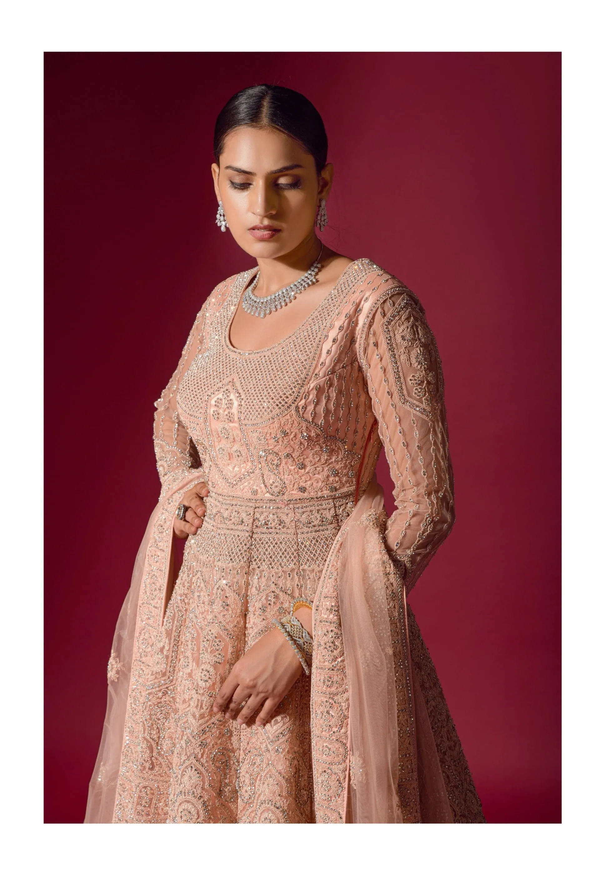 Exquisite Peach Bridal Lehenga with Detailed Embroidery